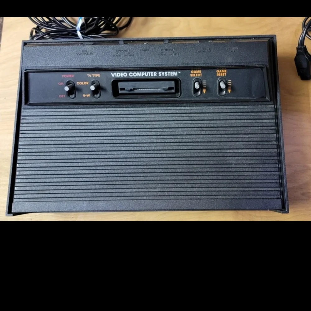 Atari Black Video Game Console with Controllers